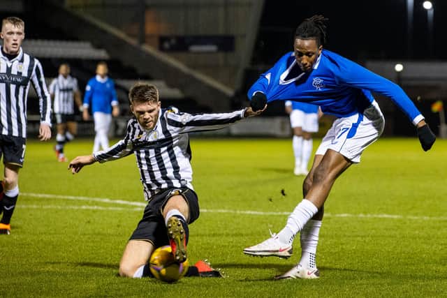Joe Aribo takes a shot under challenge from Marcus Fraser during the Betfred Cup quarter final  (Photo by Craig Williamson/SNS Group)