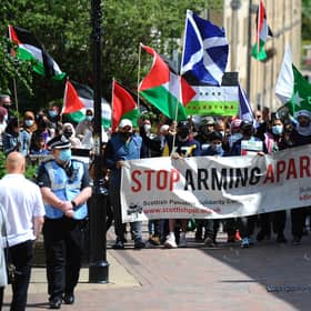 Falkirk's High Street hosted a peace rally as organisers stood in solidarity with the Palestinian people. The event was led by the Central Scotland Regional Equality Council, Al Masaar SCIO and Falkirk Central Mosque. Picture: Michael Gillen.