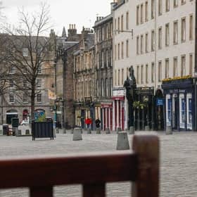 Pubs and restaurants in Edinburgh's Grassmarket have been hit by restrictions