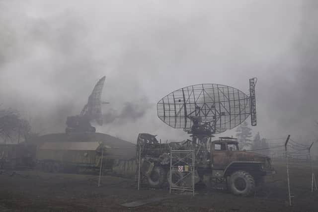 Smoke rise from an air defense base in the aftermath of an apparent Russian strike in Mariupol, Ukraine, on Thursday, February 24th. Photo: AP Photo/Evgeniy Maloletka.