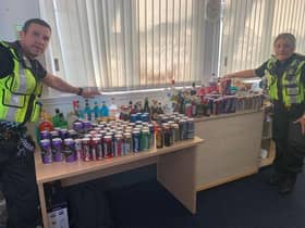 British Transport Police officers with alcohol seized from rail passengers in the west of Scotland
Pic: BTP