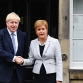 Scotland needs better leaders than Nicola Sturgeon and Boris Johnson to deal with growing cost-of-living crisis (Picture: Jeff J Mitchell/Getty Images)