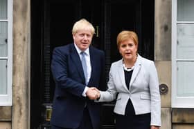 Scotland needs better leaders than Nicola Sturgeon and Boris Johnson to deal with growing cost-of-living crisis (Picture: Jeff J Mitchell/Getty Images)