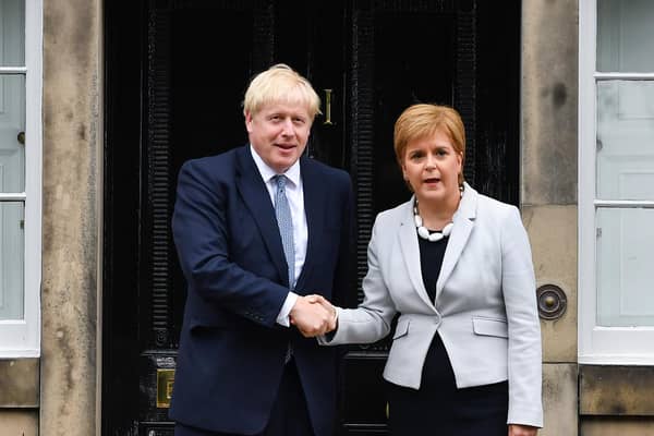 Scotland needs better leaders than Nicola Sturgeon and Boris Johnson to deal with growing cost-of-living crisis (Picture: Jeff J Mitchell/Getty Images)