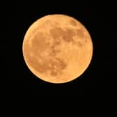 June saw a 'Strawberry' supermoon, rising here over Los Angeles. Photo: Frederic J. BROWN / AFP.