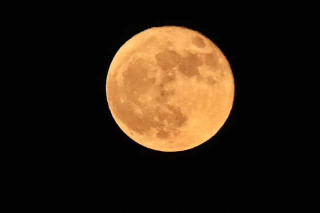 June saw a 'Strawberry' supermoon, rising here over Los Angeles. Photo: Frederic J. BROWN / AFP.