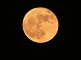 June saw a 'Strawberry' supermoon, rising here over Los Angeles. Photo: Frederic J. BROWN / AFP.