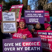 Campaigners hold placards in support of assisted dying in November last year in London. Picture: Carl Court/Getty Images