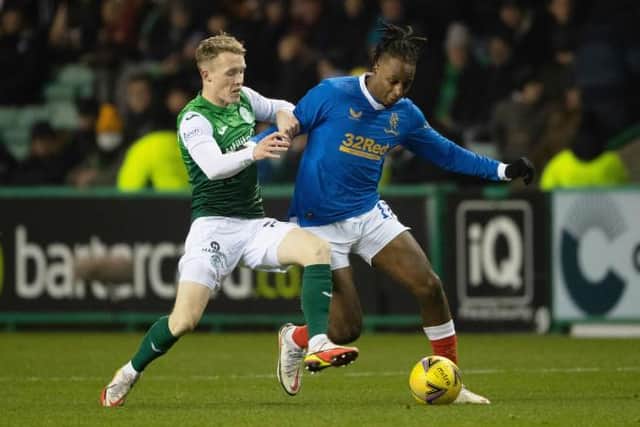 Hibs midfielder Jake Doyle-Hayes battles for possession with Rangers' Joe Aribo during the Premiership match at Easter Road. (Photo by Craig Foy / SNS Group)