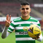Celtic's Mohamed Elyounoussi gives three reasons why he believes Chris Sutton was wrong to question him as he holds the match ball after his hat-trick at Motherwell (Photo by Rob Casey / SNS Group)