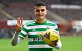 Celtic's Mohamed Elyounoussi gives three reasons why he believes Chris Sutton was wrong to question him as he holds the match ball after his hat-trick at Motherwell (Photo by Rob Casey / SNS Group)