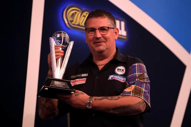 Gary Anderson with his runners up trophy after losing the final against Gerwyn Price at the World Darts Championship.