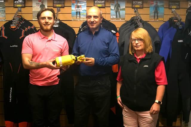 Secretary Open Water Rescue Antony Coia, (middle) with staff at Lomo Watersports Glasgow launching the Community Water Rescue Equipment project.