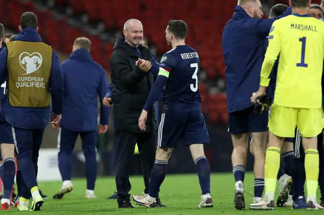 Scotland manager Steve Clarke shakes hands with Andy Robertson of Scotland after his team's shoot-out victory v Israel (Photo by Ian MacNicol/Getty Images)