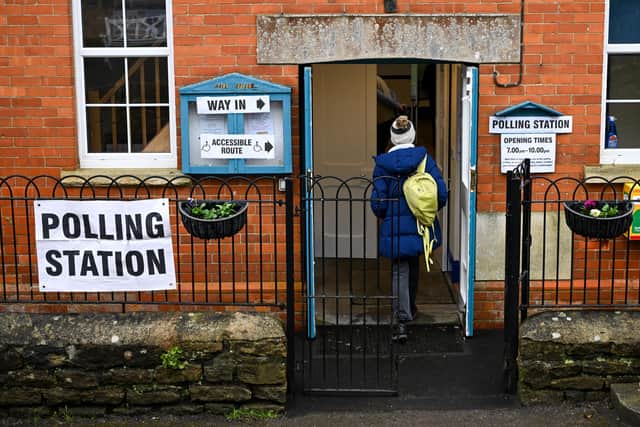This is the first general election at which voters will be required to show an acceptable form of photographic identification (Picture: Finnbarr Webster/Getty Images)