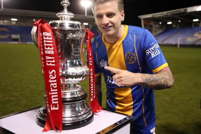 Cummings made a big impression in this season's FA Cup, scoring twice for Shrewsbury Town against Liverpool.