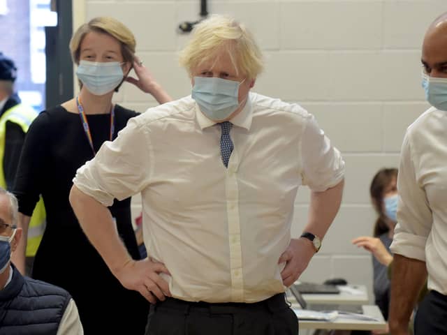 British Prime Minister Boris Johnson visits Stow Health Vaccination centre in Westminster on December 13, 2021 in London, England. (Photo by Jeremy Selwyn - WPA Pool/Getty Images)