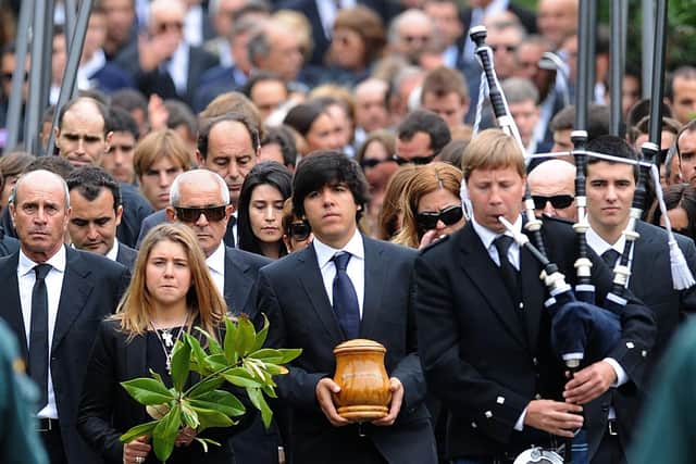 A piper plays at the funeral of Seve Ballesteros in 2011. He had a special connection with Scotland following his Open win at St Andrews in 1984. Picture: Denis Doyle/Getty Images