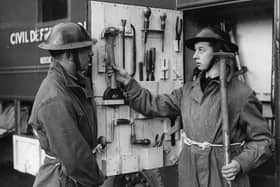 National Service volunteers in 1953 at a Civil Defence training centre at Taymouth Castle near Aberfeldy, with tools stored in the emergency vans