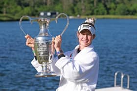 Nelly Korda celebrates with the trophy after winning The Chevron Championship at The Club at Carlton Woods in The Woodlands, Texas. Picture: Gregory Shamus/Getty Images.