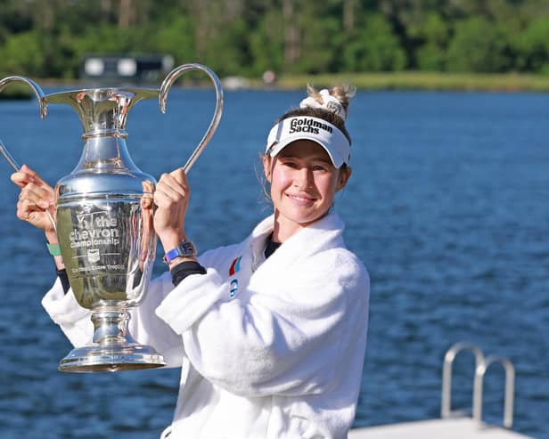 Nelly Korda celebrates with the trophy after winning The Chevron Championship at The Club at Carlton Woods in The Woodlands, Texas. Picture: Gregory Shamus/Getty Images.