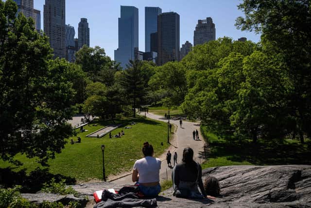 People sit in Central Park in New York City. Picture: Ed Jones/AFP via Getty Images