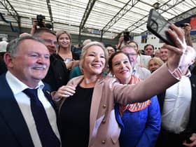 Northern Ireland's Sinn Féin leader Michelle O'Neill and Ireland's Sinn Féin leader Mary Lou McDonald pose for a selfie with colleagues and supporters as the votes are counted (Picture: Charles McQuillan/Getty Images)