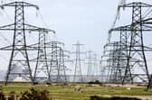 Overhead power cables. The National Grid has asked for two coal-fired power stations to warm up to meet potential energy demand. Picture: Gareth Fuller/PA Wire