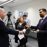 First Minister Humza Yousaf (right) during a visit to New Gorbals Health and Care Centre in Glasgow to announce additional funding to tackle health inequality and to meet some of the surgery staff and patients who have benefitted from previous funding.