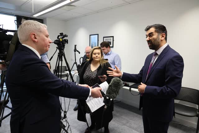 First Minister Humza Yousaf (right) during a visit to New Gorbals Health and Care Centre in Glasgow to announce additional funding to tackle health inequality and to meet some of the surgery staff and patients who have benefitted from previous funding.