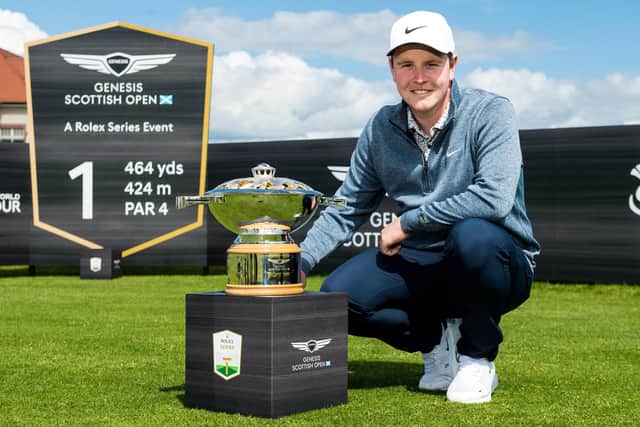 Bob MacIntyre with the Genesis Scottish Open Trophy during a media day for the Rolex Series event at The Renaissance Club in East Lothian. Picture: Ross Parker/SNS Group.