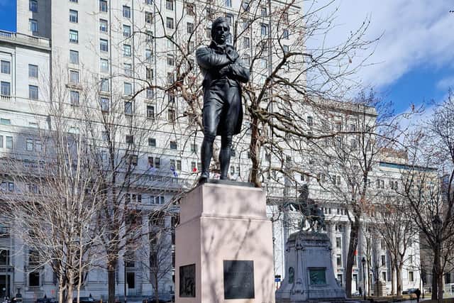 A statue of Robert Burns stands in Montreal's Dorchester Square.