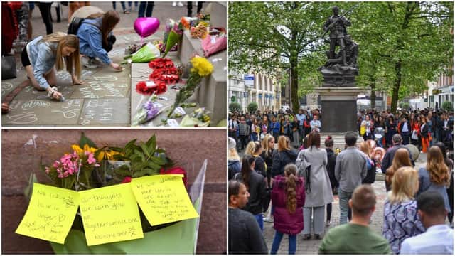Messages are written and tributes laid in memory of the victims of the Manchester bombing two years after the attack (Getty Images)