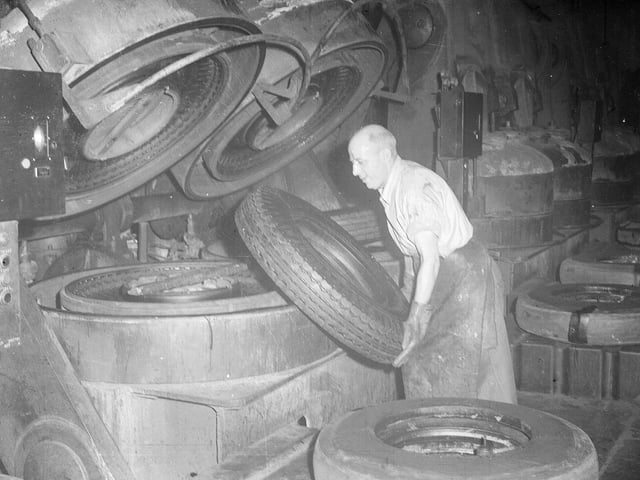 A man working on the manufacture of tyres at the North British factory in 1951.
