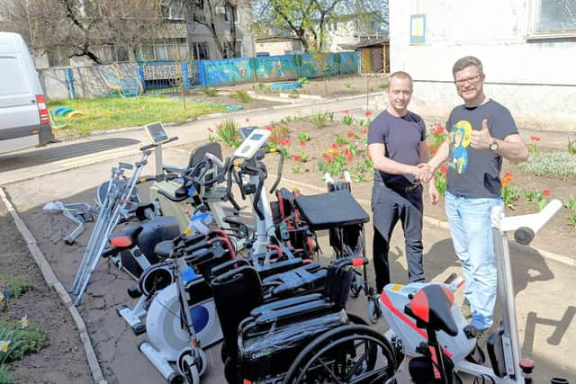 Oleg Dmitriev, handing over the equipment in Pershotravensk, Ukraine.