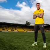 Anthony Stokes after being unveiled as a Livingston player, standing on the artificial pitch the West Lothian side also train on. Picture: SNS