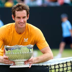 Andy Murray celebrates with the trophy after victory in the Rothesay Open Nottingham final against Arthur Cazaux. Pic: Nigel French/PA Wire.