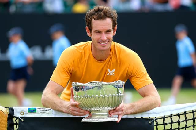 Andy Murray celebrates with the trophy after victory in the Rothesay Open Nottingham final against Arthur Cazaux. Pic: Nigel French/PA Wire.