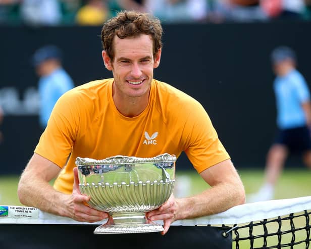 Andy Murray celebrates with the trophy after victory in the Rothesay Open Nottingham final against Arthur Cazaux. Pic: Nigel French/PA Wire.