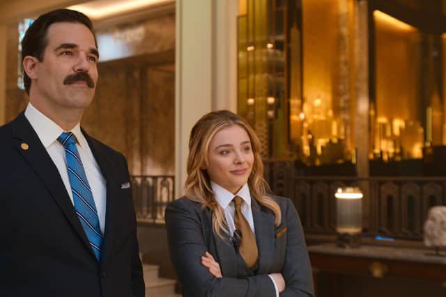 Rob Delaney as Mr Dubros and Chloe Grace Moretz as Kayla in Tom and Jerry The Movie. Pic: PA Photo/Warner Bros.