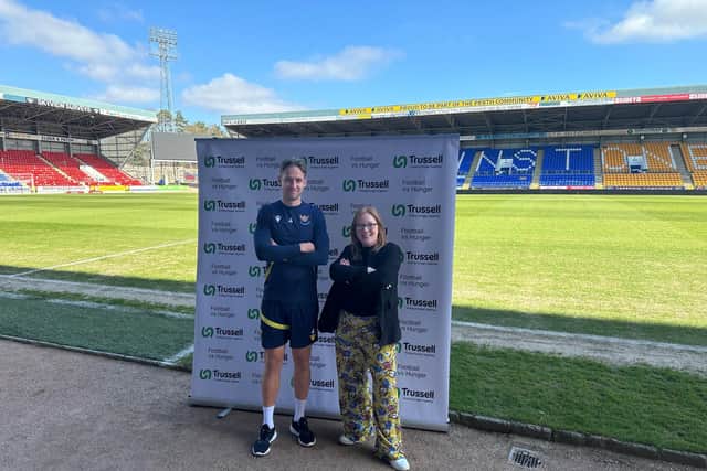 Daniels Balodis and Lori Hughes from Perth and Kinross Foodbank launch Football vs Hunger
