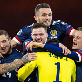 Scotland's players react to Kenny McLean's winning penalty after the Euro 2020 Play off match between Scotland and Israel at Hampden Park. (Photo by Craig Williamson / SNS Group)