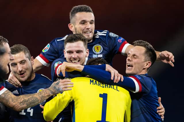 Scotland's players react to Kenny McLean's winning penalty after the Euro 2020 Play off match between Scotland and Israel at Hampden Park. (Photo by Craig Williamson / SNS Group)