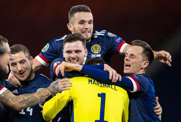 Scotland's players react to Kenny McLean's winning penalty after the Euro 2020 Play off match between Scotland and Israel at Hampden Park. (Photo by Craig Williamson / SNS Group)