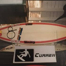 Vintage surfboards on display in a surf shop in Santa Cruz, California, including pro models ridden by Tom Curren and Rob Machado PIC: Roger Cox / JPI Media