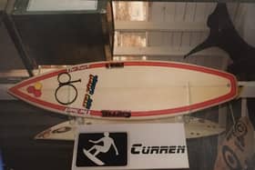 Vintage surfboards on display in a surf shop in Santa Cruz, California, including pro models ridden by Tom Curren and Rob Machado PIC: Roger Cox / JPI Media