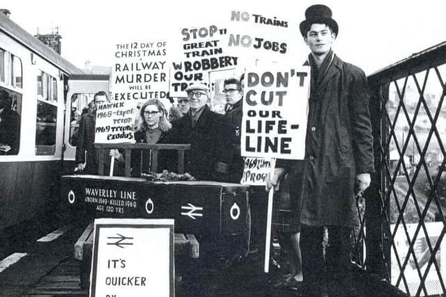 Campaigner Andrew Boyd, right, taking part in a last-ditch protest against closure of the line in 1969