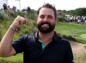 Matthew Baldwin shows what it means to win for the first time on the DP World Tour, having made his breakthrough in the SDC Championship St Francis Links in South Africa on Sunday. Picture: Warren Little/Getty Images.