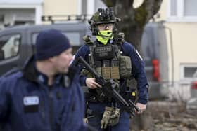 Finnish police officers investigate (Photo by MARKKU ULANDER/Lehtikuva/AFP via Getty Images)