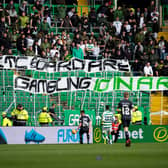 Celtic fans are known for having a pop at the board through banners at matches